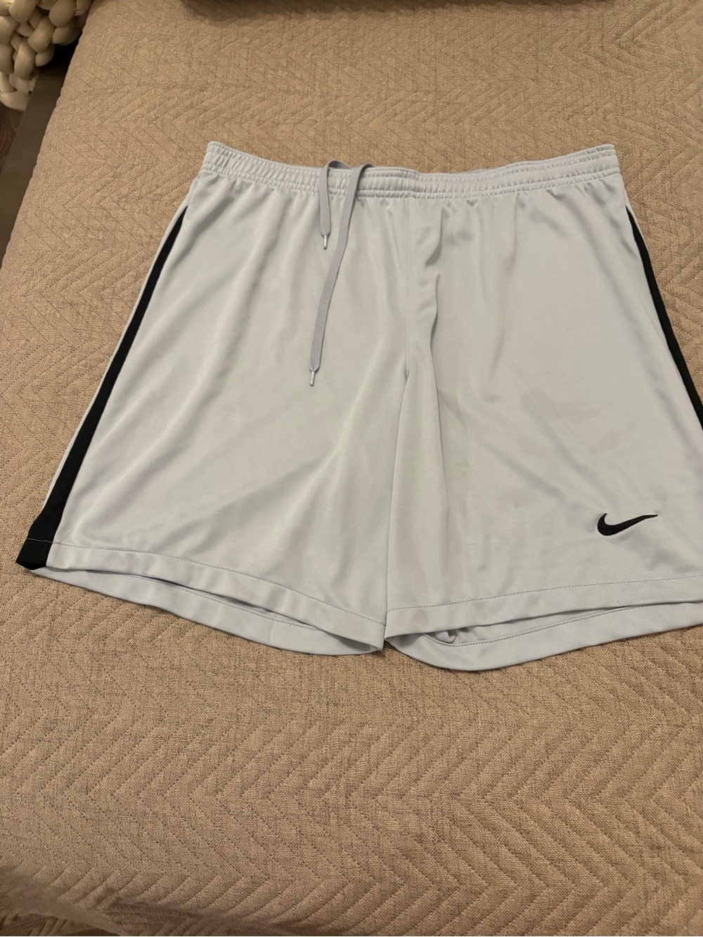 Nike Men's White Athletic Shorts with Black Side Stripe